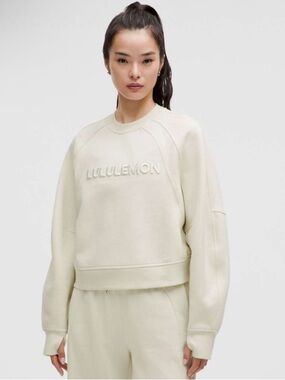lululemon NWOT Cream Embossed Scuba Logo Crew Sweatshirt in Bone size L XL